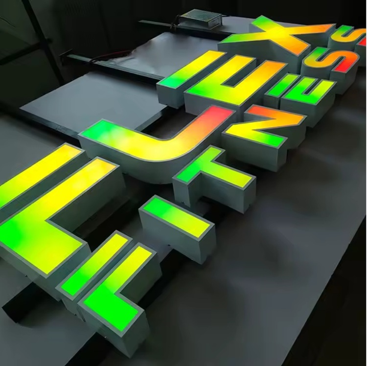 12V RGBC LED module creating yellow and green gradient effects for glowing letters.