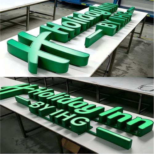 Custom green frontlit 3D letter sign workshop.