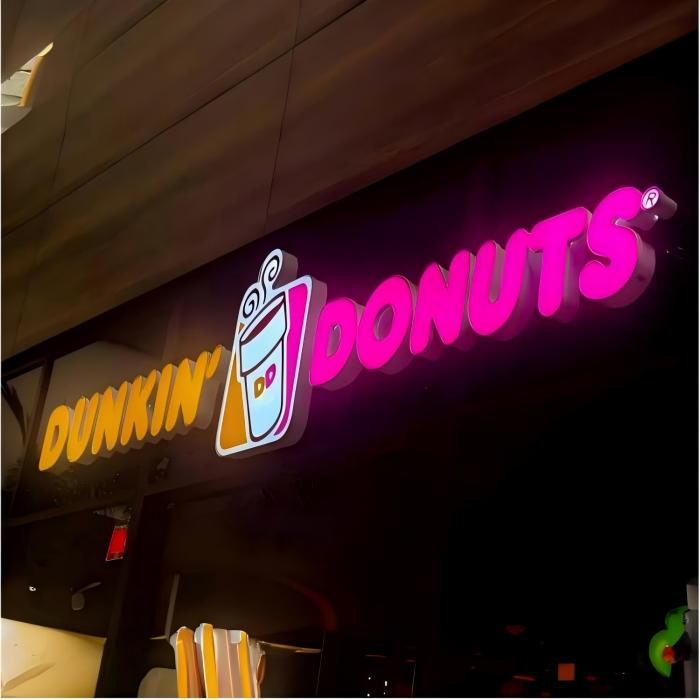 Storefront custom 3D backlit logo letter sign.